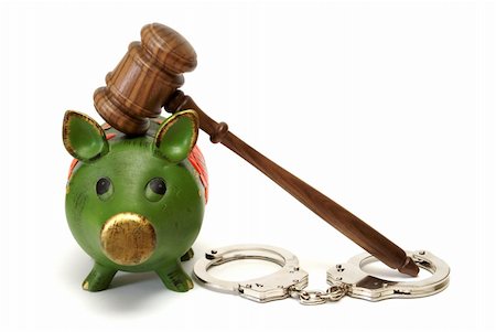 simsearch:400-08624071,k - A pig bank, handcuffs, and a mallet represent legal expense concepts. Stock Photo - Budget Royalty-Free & Subscription, Code: 400-05904510