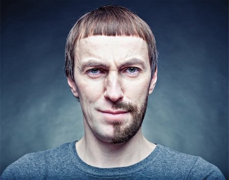 freak - half stage shaving the face. photo concept Stock Photo - Budget Royalty-Free & Subscription, Code: 400-05904582