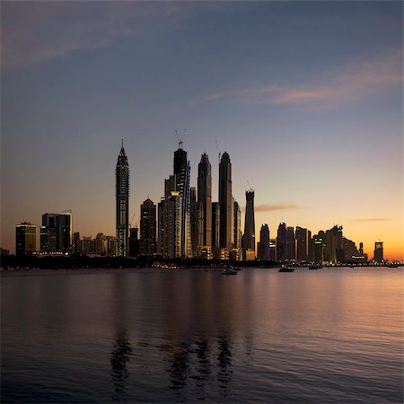 scenic dubai - View at modern skyscrapers in Dubai Marina at sunset, UAE Stock Photo - Budget Royalty-Free & Subscription, Code: 400-05904802