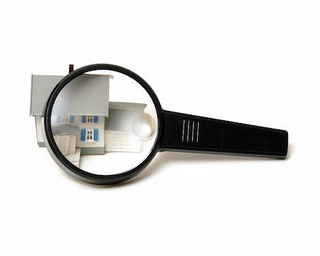 simsearch:400-05899415,k - A home inspection concept using a model house and a magnifying glass. Photographie de stock - Aubaine LD & Abonnement, Code: 400-05905128