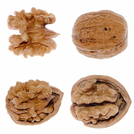 simsearch:400-04820004,k - Walnuts in closeup isolated on white background. Stockbilder - Microstock & Abonnement, Bildnummer: 400-05905191