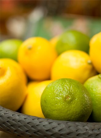 simsearch:400-04395073,k - Basket full with green and yellow citrus fruits Stock Photo - Budget Royalty-Free & Subscription, Code: 400-05905288