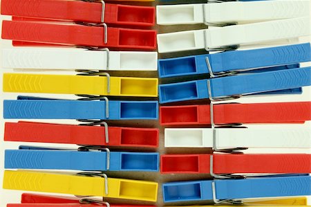 simsearch:400-04383276,k - Several colored plastic clothespins for a bright background Stock Photo - Budget Royalty-Free & Subscription, Code: 400-05905742