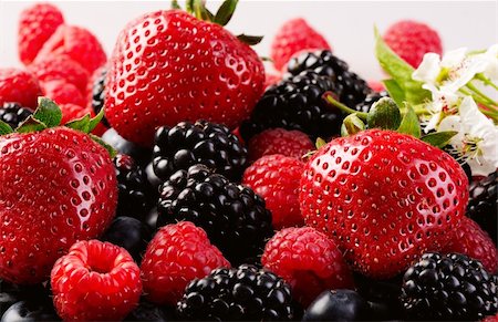 simsearch:400-05168860,k - Mix from fresh berries on a table, a bilberry, a raspberry, a strawberry. Photographie de stock - Aubaine LD & Abonnement, Code: 400-05905802