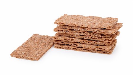 snack cracker white background - Stack of rye crispbreads isolated over white Stock Photo - Budget Royalty-Free & Subscription, Code: 400-05906287