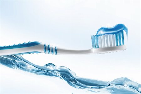ersler (artist) - close up view of toothbrush  and some toothpaste on it on white back Photographie de stock - Aubaine LD & Abonnement, Code: 400-05906447