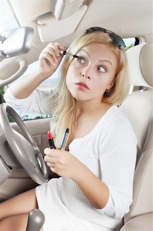 ersler (artist) - portrait of young beautiful woman sitting in the car Foto de stock - Royalty-Free Super Valor e Assinatura, Número: 400-05906477