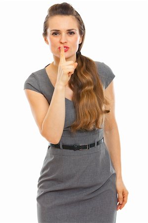 Business woman showing shhh gesture Foto de stock - Super Valor sin royalties y Suscripción, Código: 400-05906845