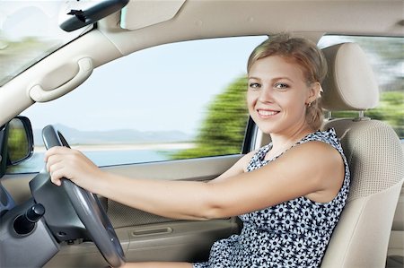 ersler (artist) - portrait of young beautiful woman sitting in the car Foto de stock - Royalty-Free Super Valor e Assinatura, Número: 400-05906980