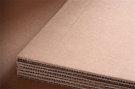 corrugated cardboard sheets with room for text Foto de stock - Super Valor sin royalties y Suscripción, Código: 400-05907021