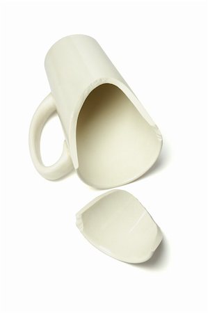 Broken Coffee Mug Lying on White Background Stock Photo - Budget Royalty-Free & Subscription, Code: 400-05907401