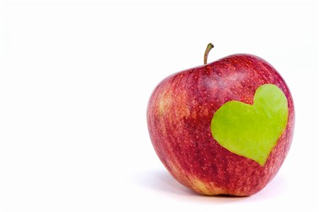 red apple with green heart on the white background Stock Photo - Budget Royalty-Free & Subscription, Code: 400-05907949