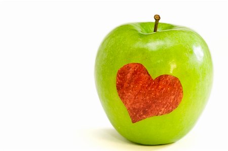 green apple with red heart on the white bachground Stock Photo - Budget Royalty-Free & Subscription, Code: 400-05907950