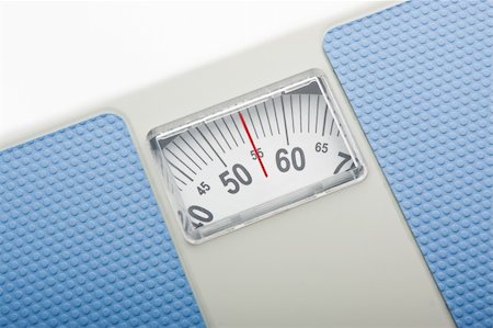 Bathroom scales isolated against a white background Foto de stock - Royalty-Free Super Valor e Assinatura, Número: 400-05907982