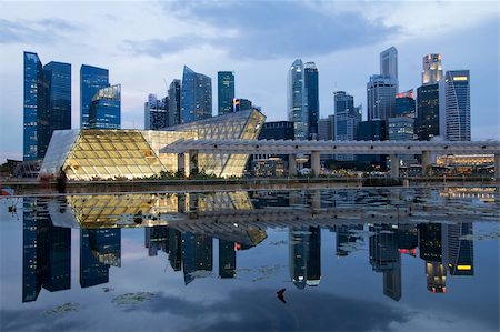 singapore building in the evening - Reflection of Singapore City Skyline on Marina Bay at Blue Hour Stock Photo - Budget Royalty-Free & Subscription, Code: 400-05908090