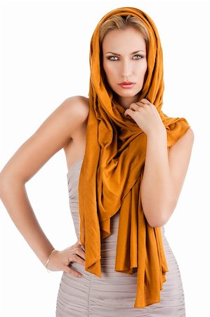 simsearch:400-04163723,k - elegant pretty young woman with a long scarf and a lighter dress. She is in front the camera, looks in to the lens. The right hand is on the hip and the left hand is near the neck Stock Photo - Budget Royalty-Free & Subscription, Code: 400-05908273