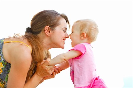 simsearch:400-06086432,k - Young mother playing with baby Stockbilder - Microstock & Abonnement, Bildnummer: 400-05908573