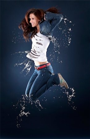 fitness model adult - beautiful dancer having fun on dark background Stock Photo - Budget Royalty-Free & Subscription, Code: 400-05908959