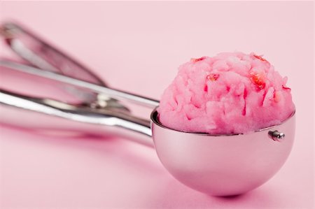 strawberry ice cream scoop - photo of strawberry ice cream inside ice creram scoop Stock Photo - Budget Royalty-Free & Subscription, Code: 400-05909891