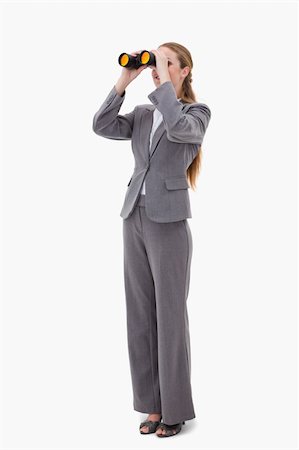simsearch:400-04554899,k - Bank employee looking through binoculars against a white background Stock Photo - Budget Royalty-Free & Subscription, Code: 400-05900496