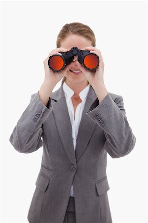 simsearch:400-04632747,k - Bank employee looking through spyglasses against a white background Fotografie stock - Microstock e Abbonamento, Codice: 400-05900491