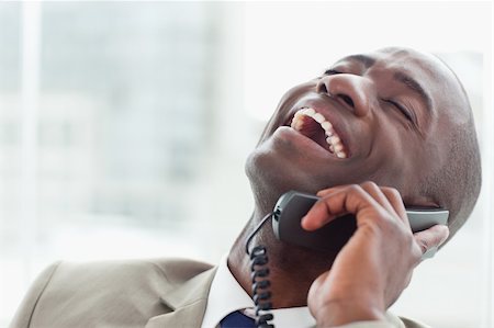 simsearch:400-05900712,k - Close up of a delighted businessman on the phone in his office Stock Photo - Budget Royalty-Free & Subscription, Code: 400-05900732