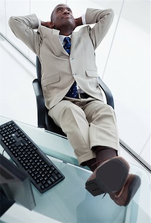 simsearch:400-05900668,k - Portrait of a happy businessman relaxing in his office Stock Photo - Budget Royalty-Free & Subscription, Code: 400-05900760