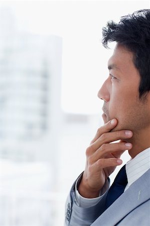 simsearch:400-04591983,k - Portrait of an office worker thinking in his office Fotografie stock - Microstock e Abbonamento, Codice: 400-05900762