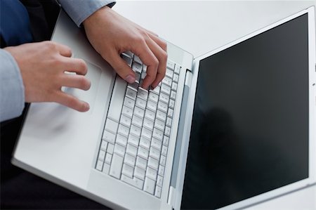 simsearch:400-04283674,k - Angle view of hands typing on a laptop Foto de stock - Super Valor sin royalties y Suscripción, Código: 400-05900865