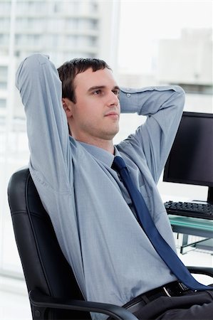 simsearch:400-04188055,k - Portrait of a manager relaxing in his office Stockbilder - Microstock & Abonnement, Bildnummer: 400-05900860