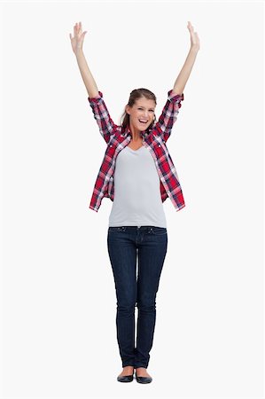 simsearch:400-04343310,k - Portrait of a woman with the arms up against a white background Photographie de stock - Aubaine LD & Abonnement, Code: 400-05900932