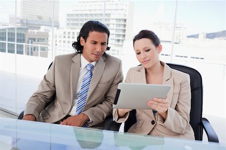 sales person with a tablet - Business team using a tablet computer in an office Stock Photo - Budget Royalty-Free & Subscription, Code: 400-05901066