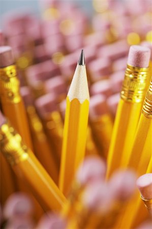 A Sharp pencil among pencil erasers. Stock Photo - Budget Royalty-Free & Subscription, Code: 400-05901487