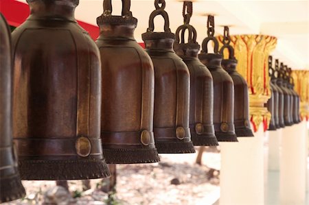 pattaya - Buddhistic bells at Big Buddha Hill temple at sunny day, Pattaya. Foto de stock - Super Valor sin royalties y Suscripción, Código: 400-05901539
