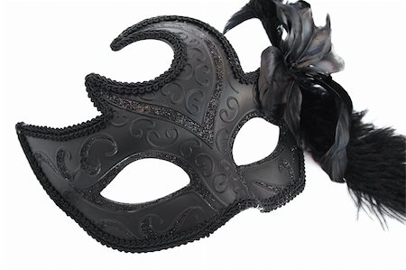 Black carnival mask isolated on white background. Stock Photo - Budget Royalty-Free & Subscription, Code: 400-05902386