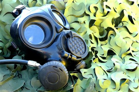 dark gas mask as chemistry technology background Stock Photo - Budget Royalty-Free & Subscription, Code: 400-05902557