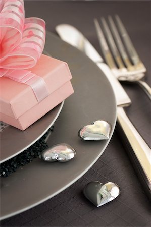 simsearch:400-05357363,k - Restaurant series. Valentine' day   dinner with table setting in pink and gray  and holiday elegant  heart ornaments Photographie de stock - Aubaine LD & Abonnement, Code: 400-05902592