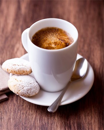 cup of coffee and two almond cookies Stock Photo - Budget Royalty-Free & Subscription, Code: 400-05902695