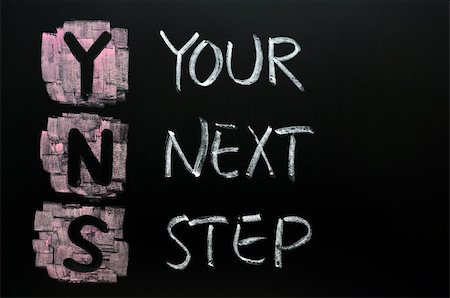 Your next step written in chalk on blackboard Stock Photo - Budget Royalty-Free & Subscription, Code: 400-05903217