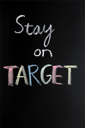 stay - Stay on target written in chalk on blackboard Stock Photo - Budget Royalty-Free & Subscription, Code: 400-05903231
