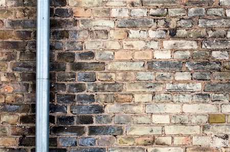 downspout - Old brick wall with drainpipe Stock Photo - Budget Royalty-Free & Subscription, Code: 400-05903485