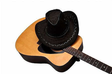 acoustic guitar and hat on a white background Stock Photo - Budget Royalty-Free & Subscription, Code: 400-05903493