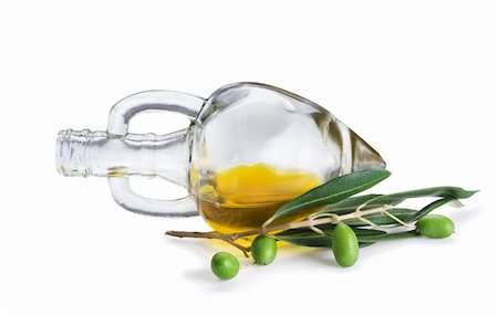 simsearch:400-04598775,k - Bottle of olive oil and fresh olive branch with olives isolated on white background Photographie de stock - Aubaine LD & Abonnement, Code: 400-05903915