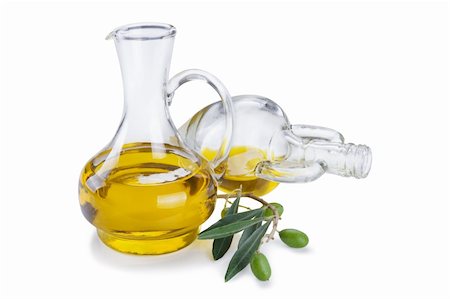 simsearch:400-04598775,k - Bottle of olive oil and fresh olive branch with olives isolated on white background Photographie de stock - Aubaine LD & Abonnement, Code: 400-05903916