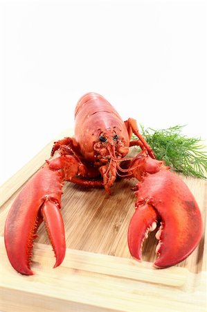 silencefoto (artist) - a lobster with dill on a wooden board Stockbilder - Microstock & Abonnement, Bildnummer: 400-05914546