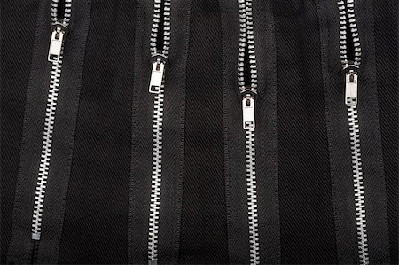 Zippers on black fabric, abstract background Stock Photo - Budget Royalty-Free & Subscription, Code: 400-05914938