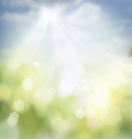 sunlight effect - Spring or summer abstract nature background with grass in the meadow and blue sky in the back Stock Photo - Budget Royalty-Free & Subscription, Code: 400-05915017