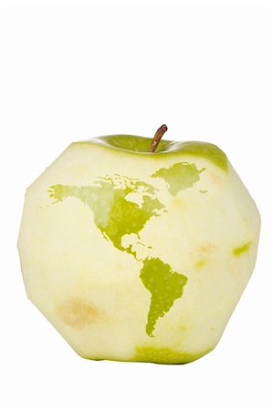 Green apple with a carving of the world map isolated on a white background. Stock Photo - Budget Royalty-Free & Subscription, Code: 400-05915063