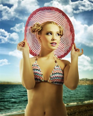 simsearch:400-04205035,k - fashion shot of blond sensual girl in bikini andtaking pose with hat on and hair style Stock Photo - Budget Royalty-Free & Subscription, Code: 400-05915080