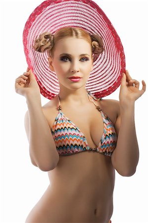 simsearch:400-04205035,k - fashion shot of blond sensual lady in bikini taking pose with hat and hair style Stock Photo - Budget Royalty-Free & Subscription, Code: 400-05915081